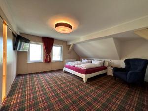 En eller flere senge i et værelse på Ferienwohnungen im Landhaus