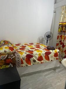 מיטה או מיטות בחדר ב-HOSPEDAJE EL MILAGRO