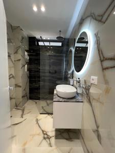 Et badeværelse på NAVI Apartments