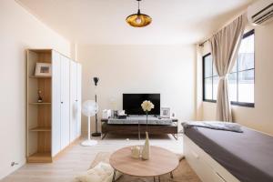 TV a/nebo společenská místnost v ubytování Napshot Guesthouse