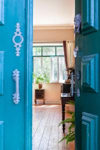 Imagem da galeria de B&B Quarto Violeta com Chaminé em Ramalhal