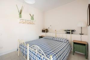 Ένα ή περισσότερα κρεβάτια σε δωμάτιο στο B&B Vigna del Duca
