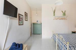 Ένα ή περισσότερα κρεβάτια σε δωμάτιο στο B&B Vigna del Duca