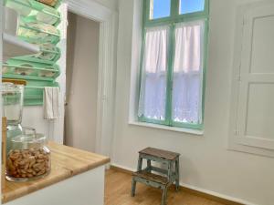 Fotografie z fotogalerie ubytování “Athenas” Neoclassic Harbour View Apartment v destinaci Symi