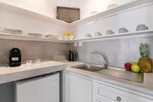 A kitchen or kitchenette at Afluencia Complex Studio No7