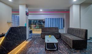 Area soggiorno di Treebo Royal, Chandrapur