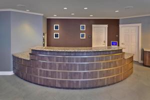 a bar in a hotel lobby with a counter at Residence Inn Hartford Avon in Avon