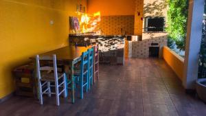 Foto de Casa Completa com Churrasqueira e Jardim em Foz