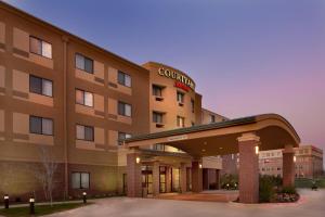 a rendering of a hotel with a building at Courtyard by Marriott Denton in Denton