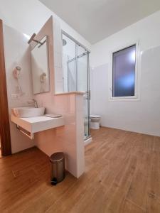 Koupelna v ubytování Kleade B&B + 37 fotografií