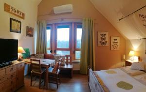 Postel nebo postele na pokoji v ubytování FerienAppartments Landhaus FühlDichWohl