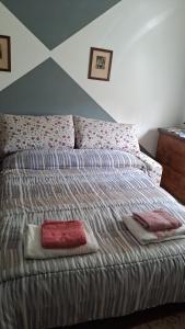 Posteľ alebo postele v izbe v ubytovaní La Casa di Lucia: Grande appartamento con balcone