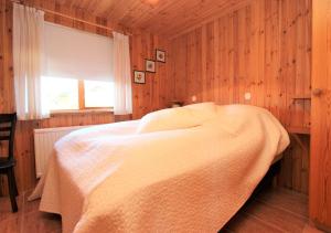 Postel nebo postele na pokoji v ubytování Eys Cabin + 10 fotografií