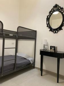 Postel nebo postele na pokoji v ubytování Garden Suite + 8 fotografií