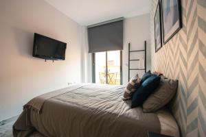 Posteľ alebo postele v izbe v ubytovaní Nordik Rooms Village - Chilches "Taby"