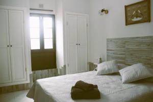 Postel nebo postele na pokoji v ubytování Casa Gioia + 22 fotografií