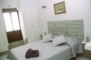 Postel nebo postele na pokoji v ubytování Casa Gioia