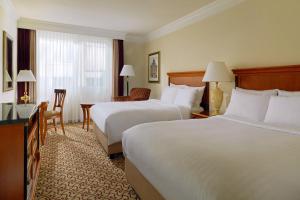 Postel nebo postele na pokoji v ubytování Leipzig Marriott Hotel + 37 fotografií