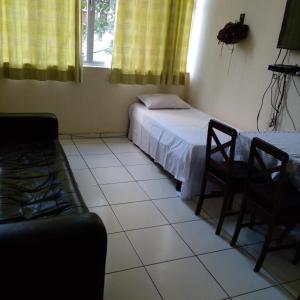 Cama o camas de una habitación en Botafogo Otima Oportunidade