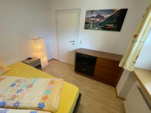 Letto o letti in una camera di Ferienwohnung Maxi