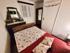 Een bed of bedden in een kamer bij Casa da Mãe