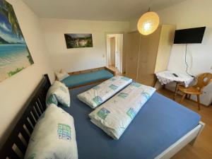 Letto o letti in una camera di Ferienwohnung Maxi