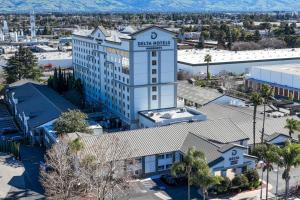 an aerial view of a hotel in a city at Delta Hotels by Marriott Santa Clara Silicon Valley in Santa Clara