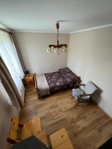 Posteľ alebo postele v izbe v ubytovaní Dom gościnny Krasne