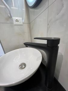 Koupelna v ubytování Stonevilla Buta