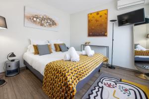Llit o llits en una habitació de HIGHLAND Annecy Rent Lodge