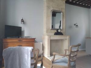 Imagine din galeria proprietății Authentique studio au cœur de Bayeux în Bayeux +8 fotografii