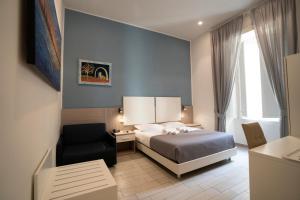 A bed or beds in a room at New Gallery