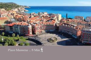 an aerial view of a city with the ocean at Central Beautifull Delille Flat in Nice