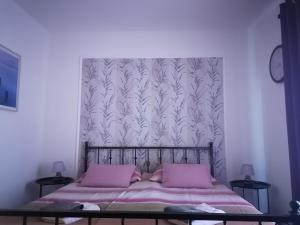 Postel nebo postele na pokoji v ubytování Slim apartman i sobe