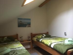 Postel nebo postele na pokoji v ubytování Guest House Josipović