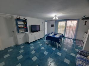 Televisyen dan/atau pusat hiburan di Villa la Torre Libeccio