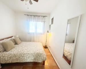 Postel nebo postele na pokoji v ubytování Villa Mas Blau Munt