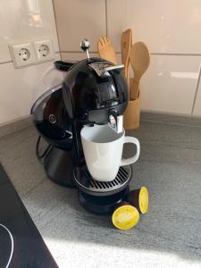Fasilitas pembuat kopi dan teh di Diane‘s Ferienwohnung