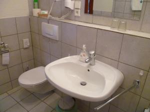 Koupelna v ubytování Hotel Koruna