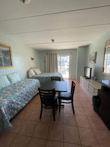 Postel nebo postele na pokoji v ubytování Barcelona Motel