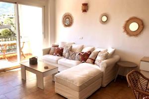 Posezení v ubytování Duplex Penthouse "Playa Y Palmeras"