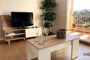 TV a/nebo společenská místnost v ubytování Duplex Penthouse "Playa Y Palmeras"