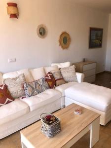 Posezení v ubytování Duplex Penthouse "Playa Y Palmeras"