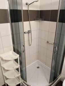 Ένα μπάνιο στο Apartament 100 Planeta 100 m od plaży