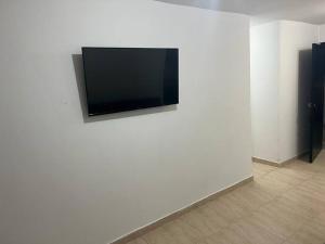 TV a/nebo společenská místnost v ubytování Bello apto en armenia 1306