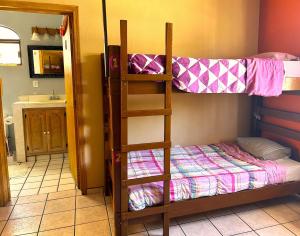 Postel nebo postele na pokoji v ubytování Sofia Hostel Cabo