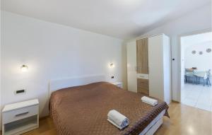 Posteľ alebo postele v izbe v ubytovaní One-Bedroom Holiday Home In Valbandon
