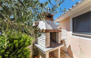 Balkón alebo terasa v ubytovaní One-Bedroom Holiday Home In Valbandon