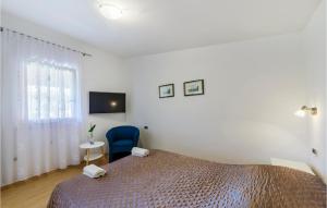 Posteľ alebo postele v izbe v ubytovaní One-Bedroom Holiday Home In Valbandon