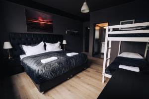 Postel nebo postele na pokoji v ubytování Brim Hotel